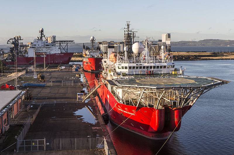 Red oil and gas vessel at Forth Ports Leith with large helipad