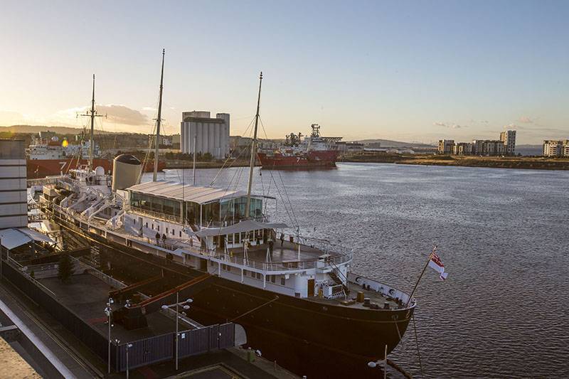 Boutique cruise vessel on Ocean Terminal Berth at Sunset